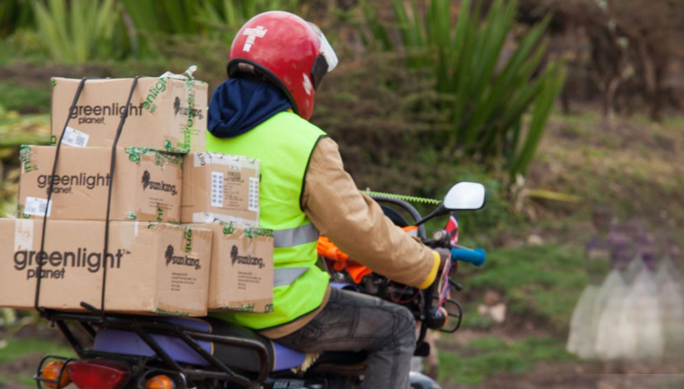 Delivering Sun King solar lighting products to the market on rural road, Longisa, Bomet county, Kenya.
Credit: Corrie Wingate Photography/SolarAid