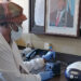A scientist in Botswana working with IAEA's equipment that uses a nuclear-derived technique to rapidly detect the coronavirus (COVID-19). The country’s new national research fund will support scientific progress. Copyright: Botswana National Veterinary Laboratory (CC BY 2.0 DEED).