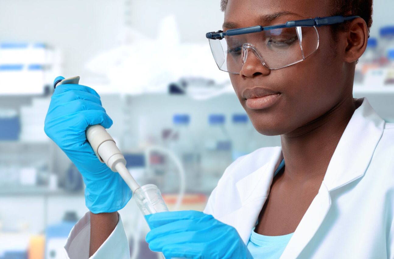 scientist holding test tube