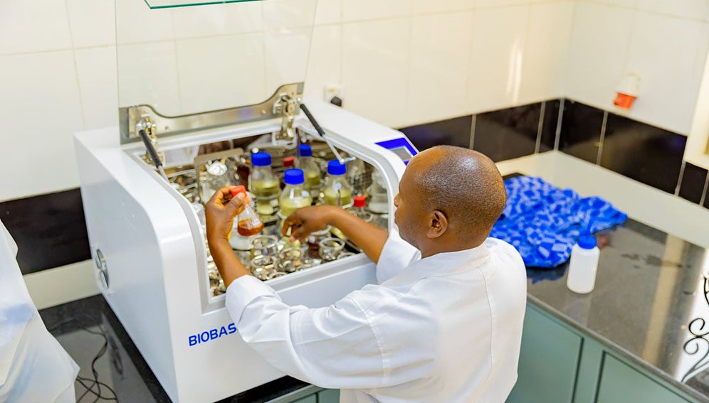 Samson Bimenyimana, a Rwandan lab sample administrator, carries out tests to develop an effective banana wine starter-culture.