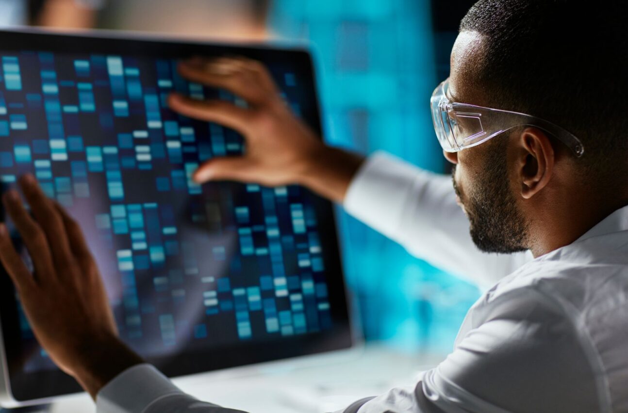 researcher looking at screen