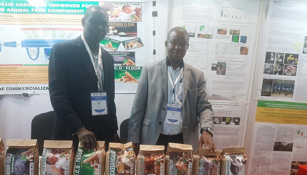 The researchers displaying cassava products