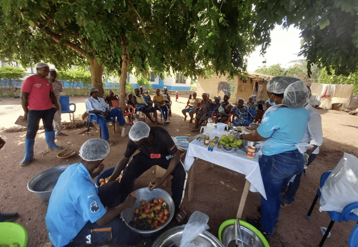 Dr. Francis Omujal showing Ugandan Shea butter machine